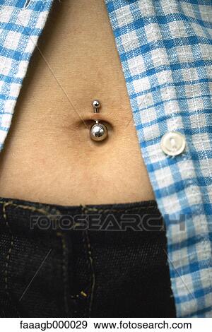 Pierced navel View Large Photo Image Stock Photo - Pierced navel. Fotosearch