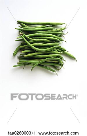 Stock Image - Pile of green beans, high angle view. Fotosearch