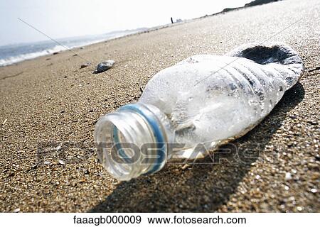 Plastic bottle on beach View Large Photo Image Stock Photo - Plastic bottle on beach. Fotosearch