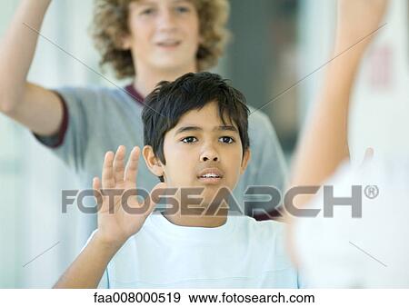 Preteen boys waving View Large Photo Image Stock Photo - Preteen boys waving. Fotosearch