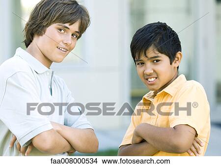 Preteen boys with arms crossed View Large Photo Image Picture - Preteen boys with arms crossed. Fotosearch