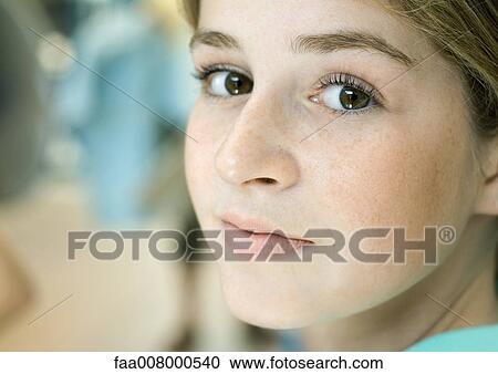 Preteen girl, close-up of face View Large Photo Image Stock Image - Preteen girl, close-up of face. Fotosearch