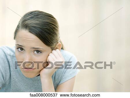 Preteen girl frowning View Large Photo Image Stock Photo - Preteen girl frowning. Fotosearch