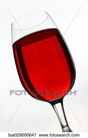 Stock Photo - Red wine in glass, close-up. Fotosearch