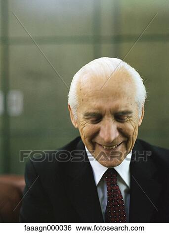 Senior businessman smiling with eyes closed, portrait View Large Photo Image Stock Photograph - Senior businessman smiling with eyes closed, portrait. Fotosearch