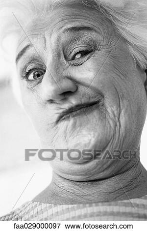 Senior woman making face at camera, portrait View Large Photo Image Stock Photo - Senior woman making face at camera, portrait. Fotosearch