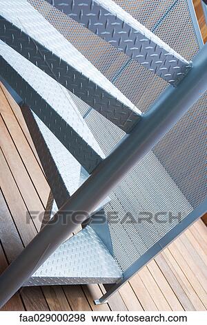 Stock Photo - Spiral staircase, cropped view. Fotosearch