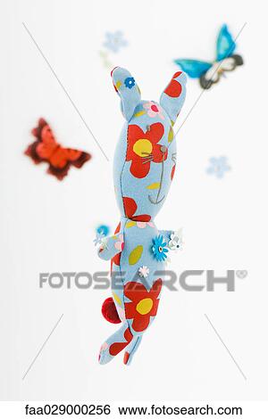 Stuffed toy surrounded by fake butterflies and flowers View Large Photo Image Stock Photograph - Stuffed toy surrounded by fake butterflies and flowers. Fotosearch