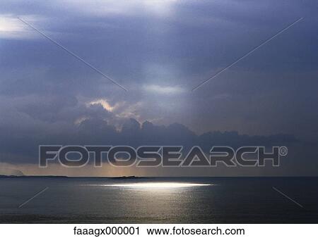 Sunbeam shining on sea View Large Photo Image Stock Image - Sunbeam shining on sea. Fotosearch