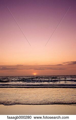 Surf at sunrise View Large Photo Image Stock Image - Surf at sunrise. Fotosearch