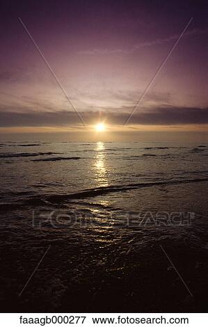 Surf at sunrise View Large Photo Image Stock Photo - Surf at sunrise. Fotosearch