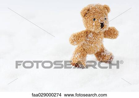 Teddy bear in snow View Large Photo Image Picture - Teddy bear in snow. Fotosearch