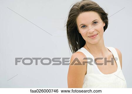 Teen girl, smiling at camera, portrait View Large Photo Image Stock Photograph - Teen girl, smiling at camera, portrait. Fotosearch