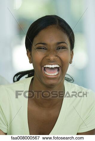 Teenage girl laughing View Large Photo Image Stock Photo - Teenage girl laughing. Fotosearch