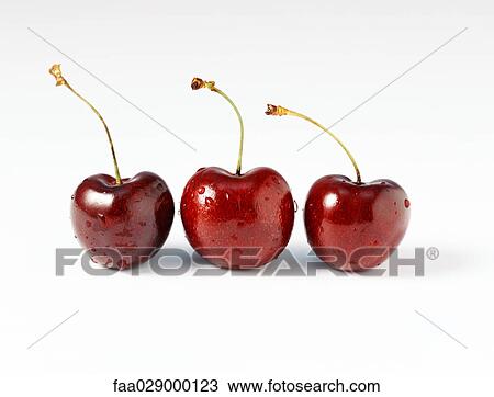 Three fresh cherries, close-up View Large Photo Image Stock Image - Three fresh cherries, close-up. Fotosearch