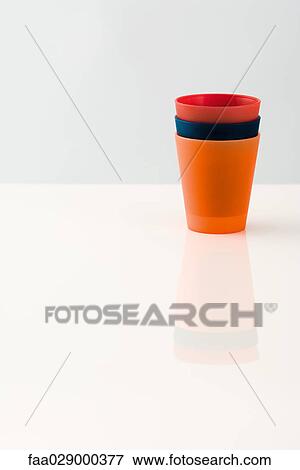 Three plastic cups, stacked View Large Photo Image Stock Photo - Three plastic cups, stacked. Fotosearch