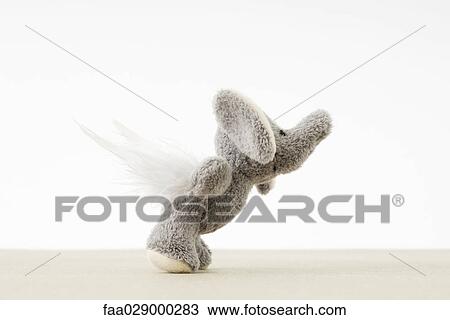 Toy elephant with wings View Large Photo Image Stock Image - Toy elephant with wings. Fotosearch