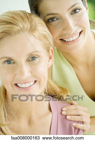 Two female friends, portrait View Large Photo Image Stock Image - Two female friends, portrait. Fotosearch