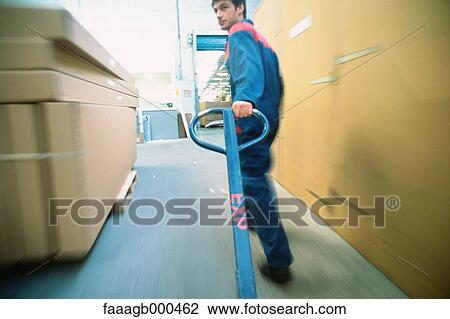 Warehouse worker View Large Photo Image Stock Image - Warehouse worker. Fotosearch