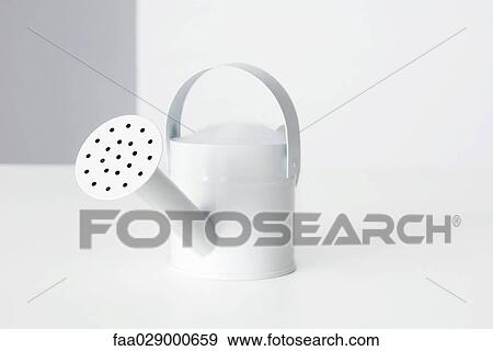 Stock Photo - Watering can, close-up. Fotosearch