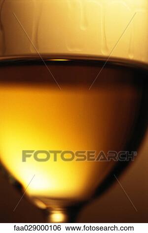 White wine in glass, extreme close-up View Large Photo Image Stock Photograph - White wine in glass, extreme close-up. Fotosearch