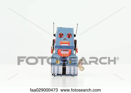 Stock Image - Wind-up robot toy. Fotosearch