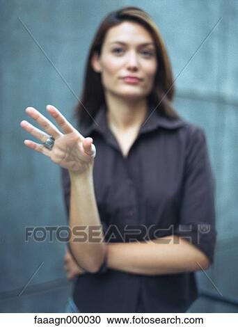 Woman gesturing, defocused View Large Photo Image Stock Image - Woman gesturing, defocused. Fotosearch