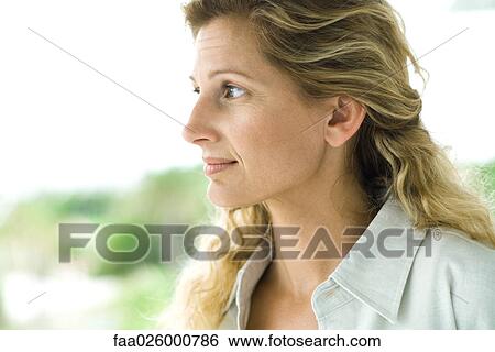 Woman, head and shoulders, side view View Large Photo Image Stock Photograph - Woman, head and shoulders, side view. Fotosearch