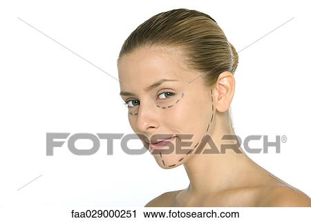 Woman with plastic surgery markings on face, smiling at camera View Large Photo Image Stock Image - Woman with plastic surgery markings on face, smiling at camera. Fotosearch