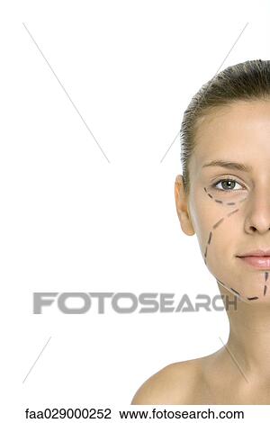 Woman with plastic surgery markings on face, looking at camera, cropped View Large Photo Image Stock Image - Woman with plastic surgery markings on face, looking at camera, cropped. Fotosearch