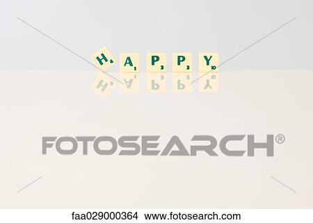 Word game tiles spelling the word "happy" View Large Photo Image Picture - Word game tiles spelling the word "happy". Fotosearch