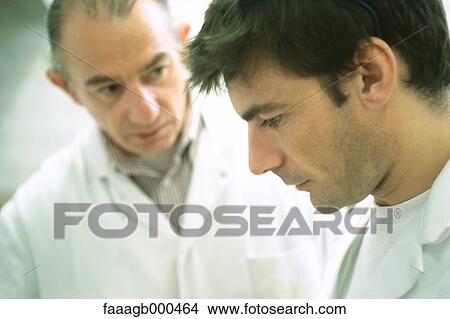 Worker and apprentice View Large Photo Image Picture - Worker and apprentice. Fotosearch