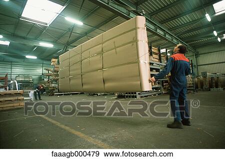 Worker in warehouse View Large Photo Image Stock Photo - Worker in warehouse. Fotosearch