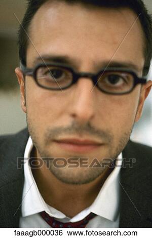 Young businessman, portrait View Large Photo Image Stock Photograph - Young businessman, portrait. Fotosearch