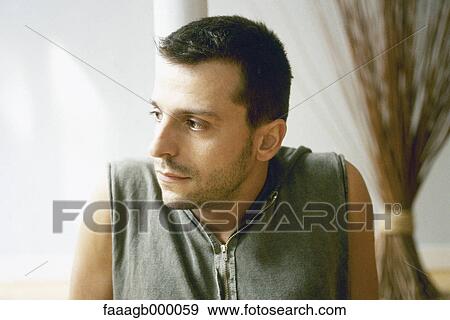 Stock Photo - Young man, portrait. Fotosearch
