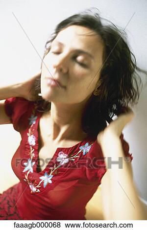 Young woman with eyes closed View Large Photo Image Stock Photo - Young woman with eyes closed. Fotosearch