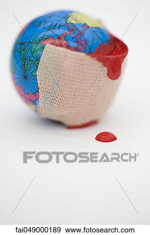 Adhesive bandage dripping blood wrapped around globe View Large Photo Image Stock Photo - Adhesive bandage dripping blood wrapped around globe. Fotosearch