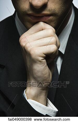 Businessman expressing uncertainty, portrait View Large Photo Image Stock Photo - Businessman expressing uncertainty, portrait. Fotosearch