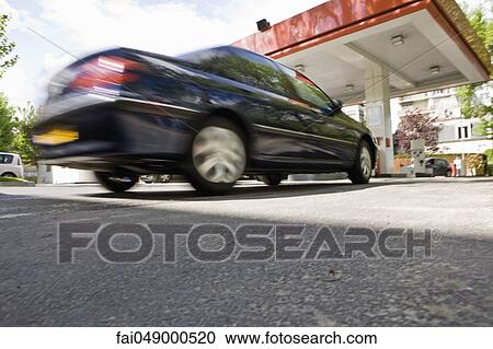 Car arriving at gas station View Large Photo Image Stock Image - Car arriving at gas station. Fotosearch
