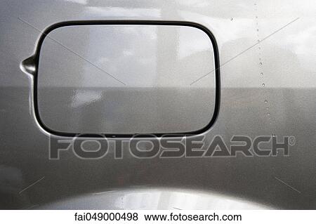 Stock Photo - Closed door of vehicle gas tank. Fotosearch