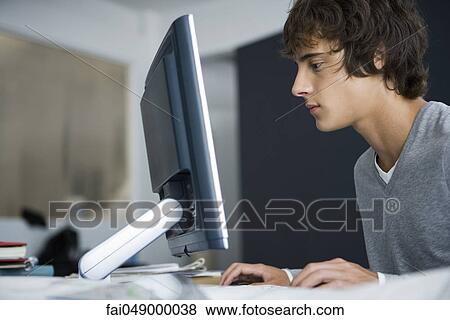 College student using computer View Large Photo Image Stock Photo - College student using computer. Fotosearch