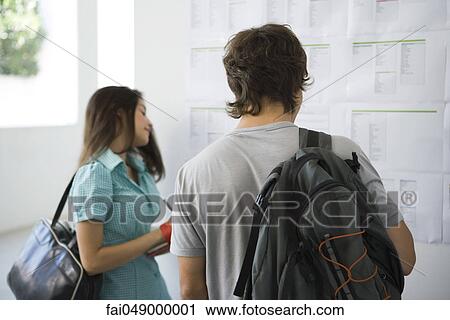 College students checking bulletin board for classroom assignments View Large Photo Image Stock Image - College students checking bulletin board for classroom assignments. Fotosearch