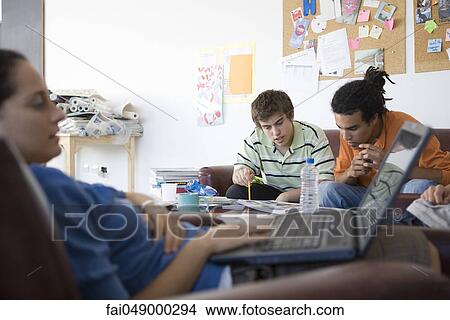 College students studying in break room View Large Photo Image Picture - College students studying in break room. Fotosearch