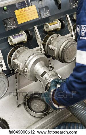 Connecting hoses to fuel tanker outlets View Large Photo Image Stock Image - Connecting hoses to fuel tanker outlets. Fotosearch