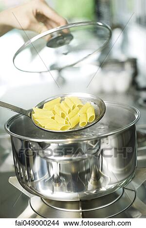 Picture - Cooking pasta. Fotosearch