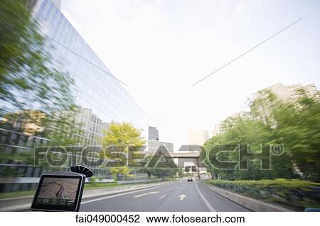 Driver's view of vehicle windshield with mounted GPS display View Large Photo Image Stock Image - Driver's view of vehicle windshield with mounted GPS display. Fotosearch