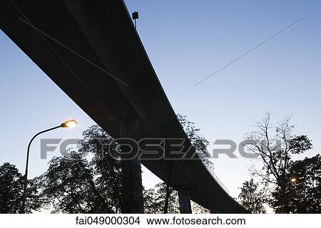 Elevated road, low angle view View Large Photo Image Picture - Elevated road, low angle view. Fotosearch