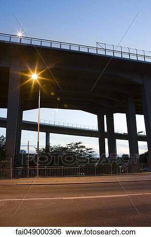Elevated road, low angle view View Large Photo Image Stock Photograph - Elevated road, low angle view. Fotosearch