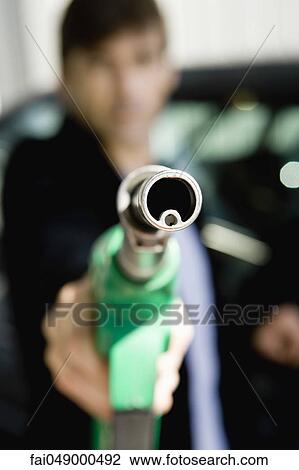 End of gas pump hose nozzle View Large Photo Image Stock Image - End of gas pump hose nozzle. Fotosearch