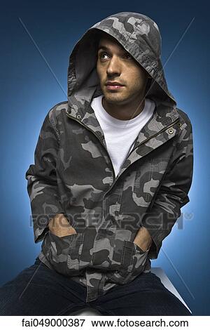 Fashionably dressed young man, portrait View Large Photo Image Stock Photo - Fashionably dressed young man, portrait. Fotosearch